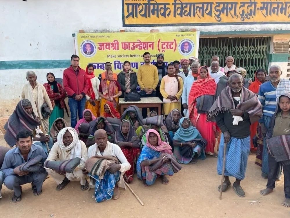 Blanket distribution at a primary school in Dumra, Dudhi