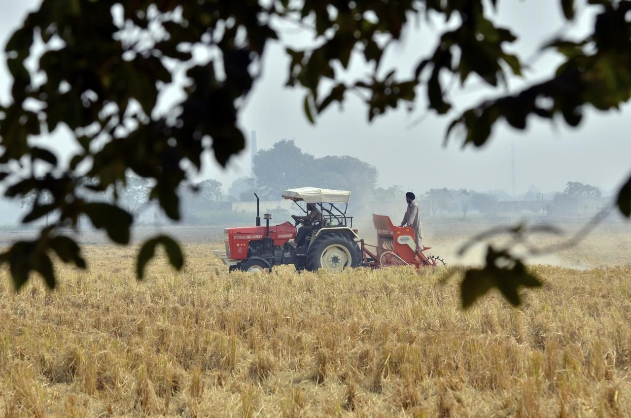 Tractor preparing a field for the wheat crop